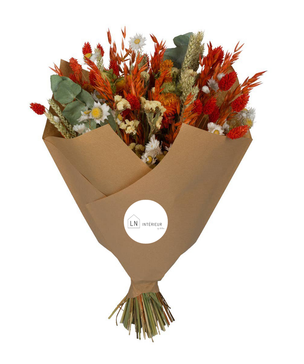Un magnifique bouquet de fleurs séchées dans des tons oranges. Une belle idée cadeau.